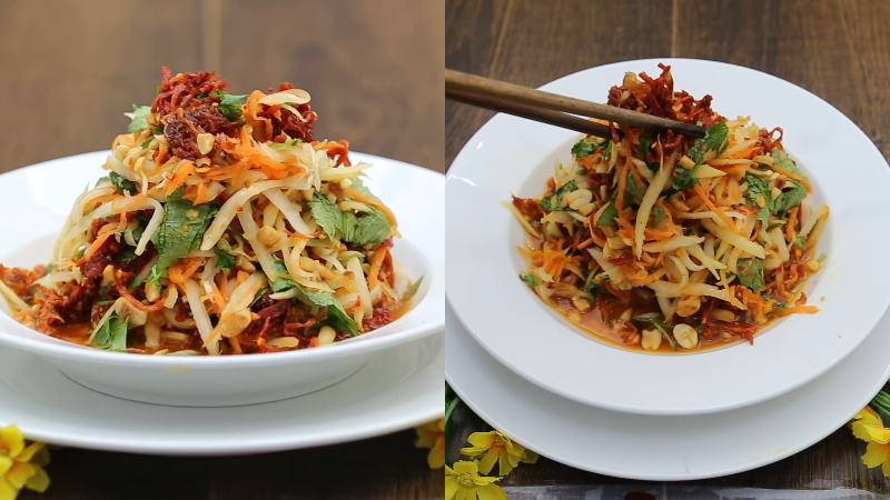 Đĩa nộm khô bò chay bày đẹp với đậu phộng rang và rau thơm
